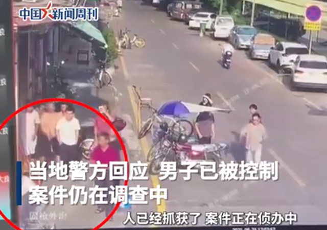 男子當街按倒女子猥褻 警方已刑拘640.jpg